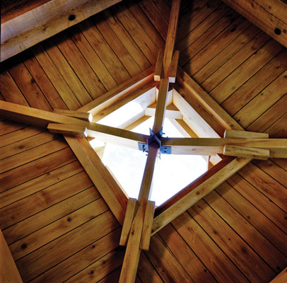 Steve Ladner of Quantum Construction worked with two finish carpenters to frame the living room's mandala ceiling.